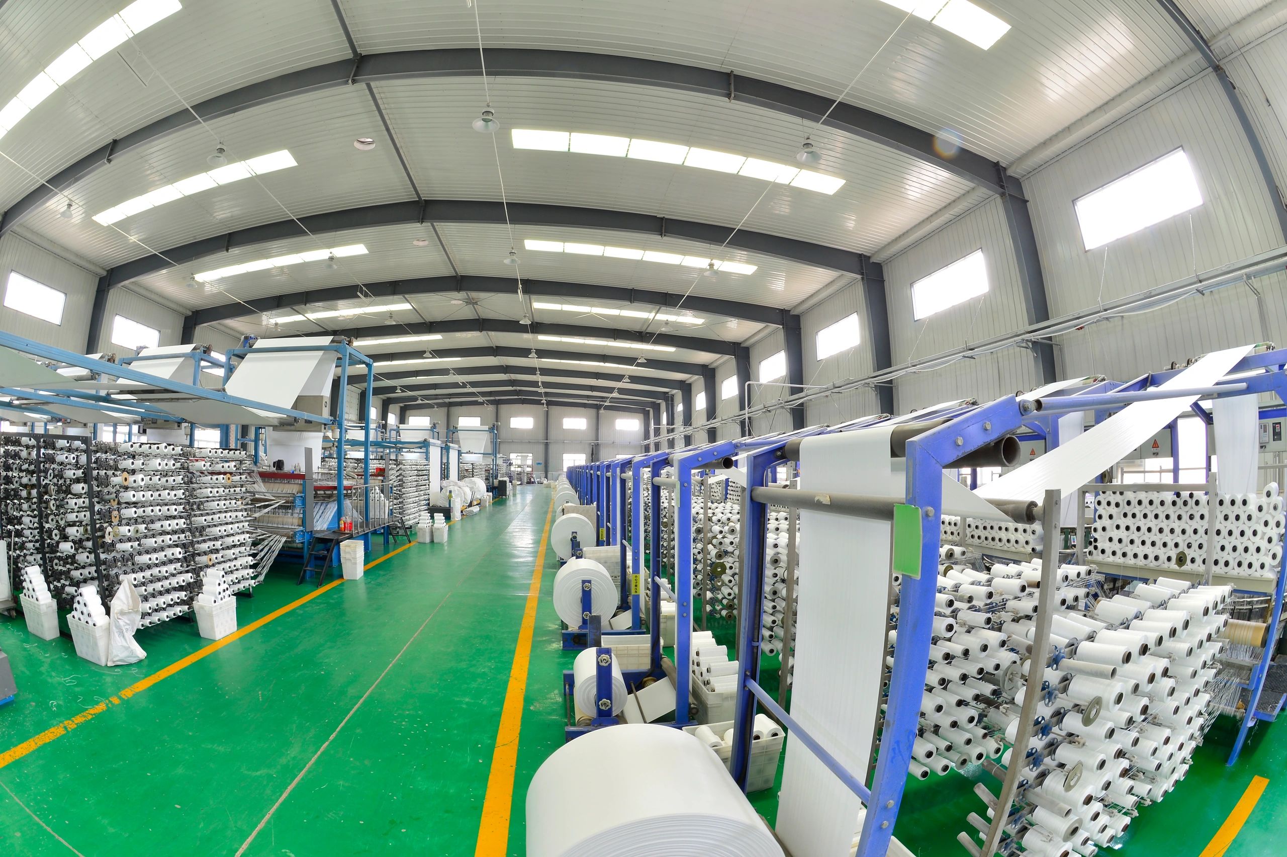 Industrial packaging line machinery in a workshop